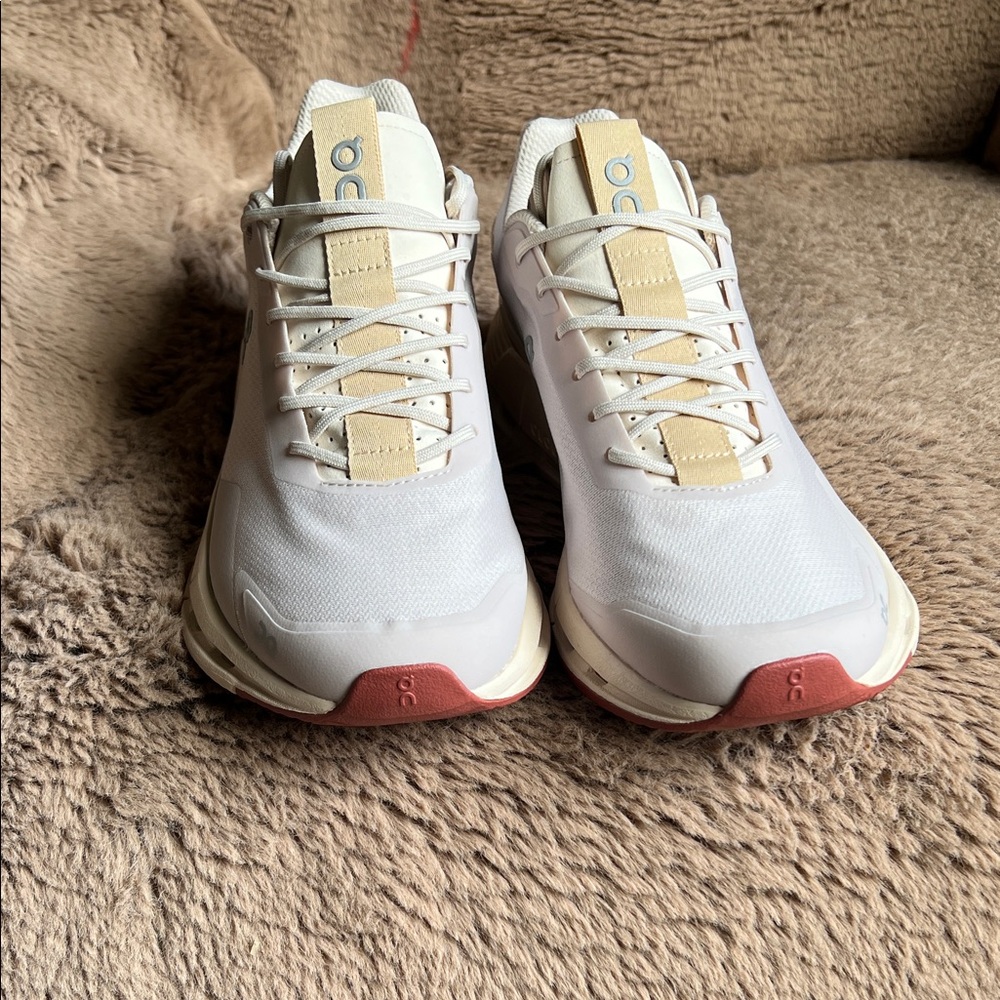 On Running White and Beige Sneakers